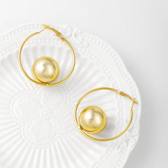 Beautiful 18K gold-plated hoop earrings adorned with a sleek ball at the end, ideal for elevating your jewelry collection.