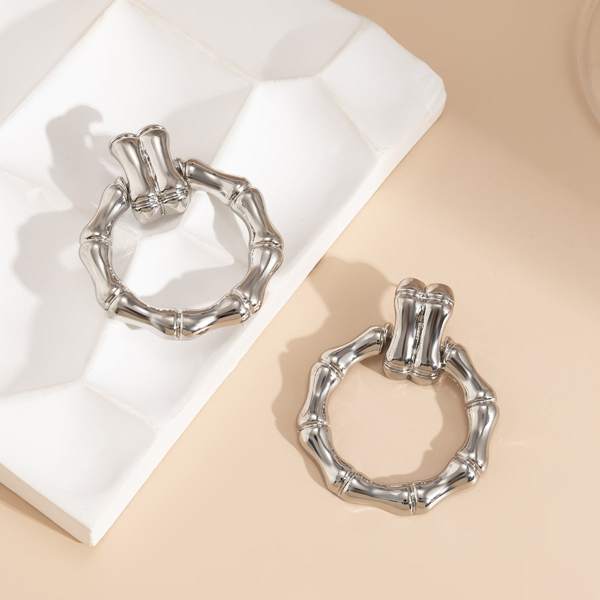 Silver-Plated Bamboo-Shaped Round Drop Earrings, silver drop earrings for women, vintage-inspired design, lifestyle look