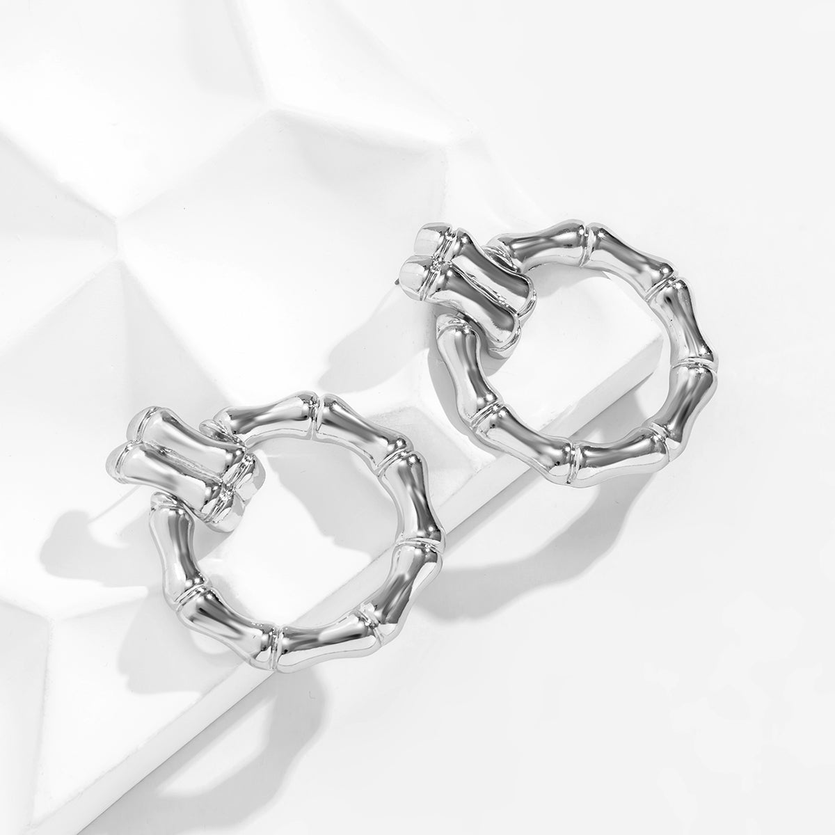Silver-Plated Bamboo-Shaped Round Drop Earrings, silver drop earrings for women, vintage-inspired design, front view