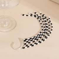 Black & White Howlite Tassel Ear Cuff