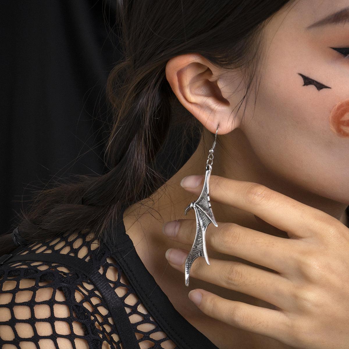 Silver-Plated Bat Wing Drop Earrings, silver drop earrings for women, vintage-inspired design, side view