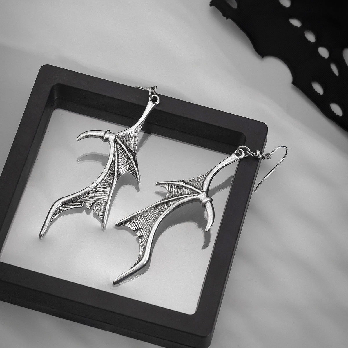 Silver-Plated Bat Wing Drop Earrings, silver drop earrings for women, vintage-inspired design, lifestyle look