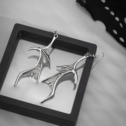Silver-Plated Bat Wing Drop Earrings, silver drop earrings for women, vintage-inspired design, lifestyle look