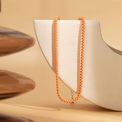 Orange Enamel and Silver-Plated Chain Necklace, silver pendant necklace for women, botanical inspired, detail close-up