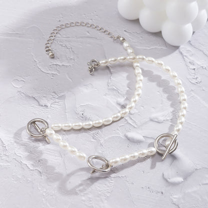 Pearl and Silver-Plated Circle Bar Station Necklace, silver pendant necklace for women, vintage-inspired design, side view