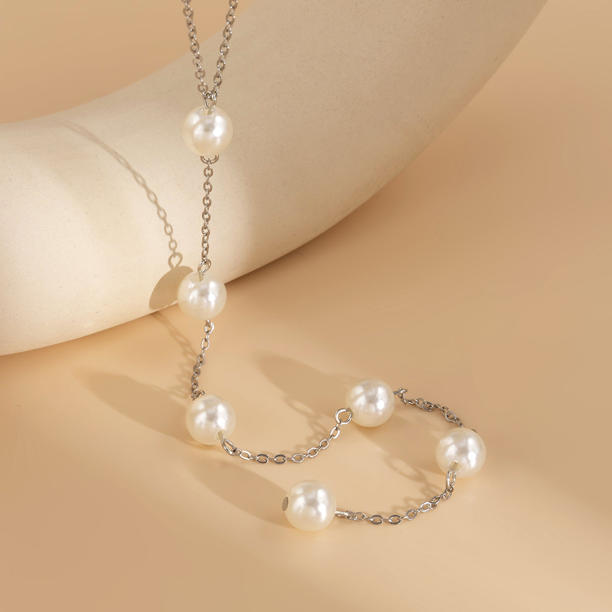 Pearl and Silver-Plated Lariat Necklace, silver pendant necklace for women, everyday style, detail close-up