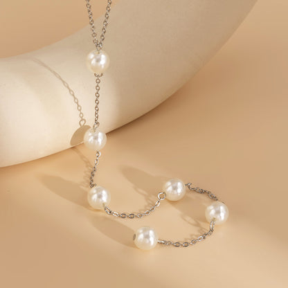 Pearl and Silver-Plated Lariat Necklace, silver pendant necklace for women, everyday style, detail close-up