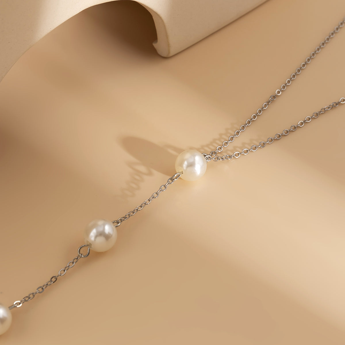Pearl and Silver-Plated Lariat Necklace, silver pendant necklace for women, everyday style, side view