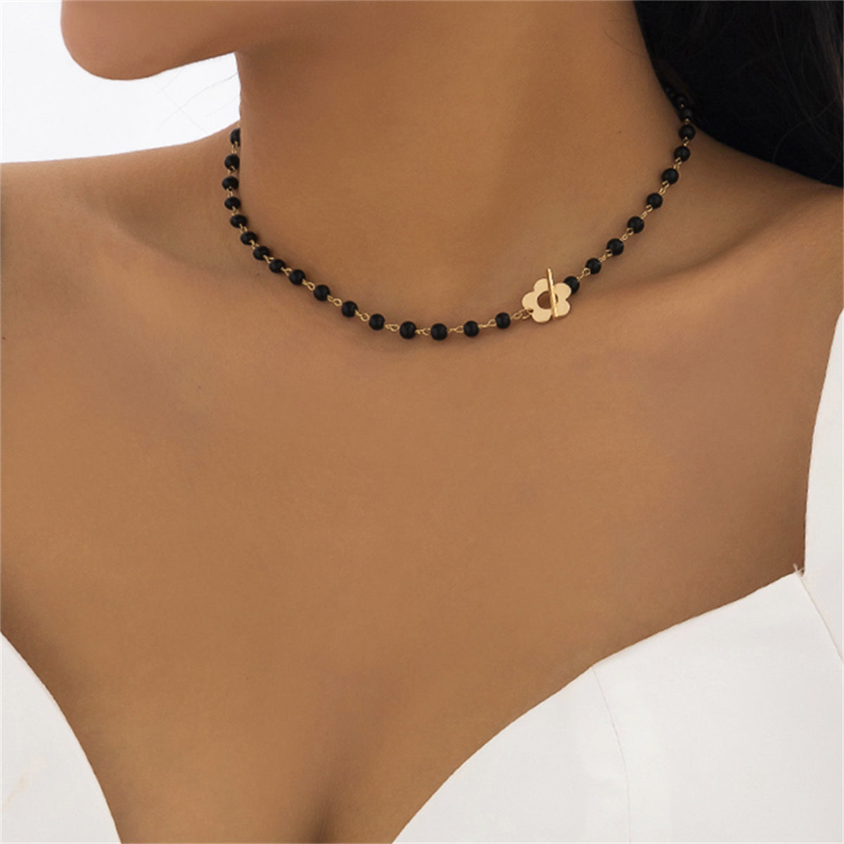 Black and 18K Gold-Plated Flower Choker Necklace, gold pendant necklace for women, botanical inspired, front view