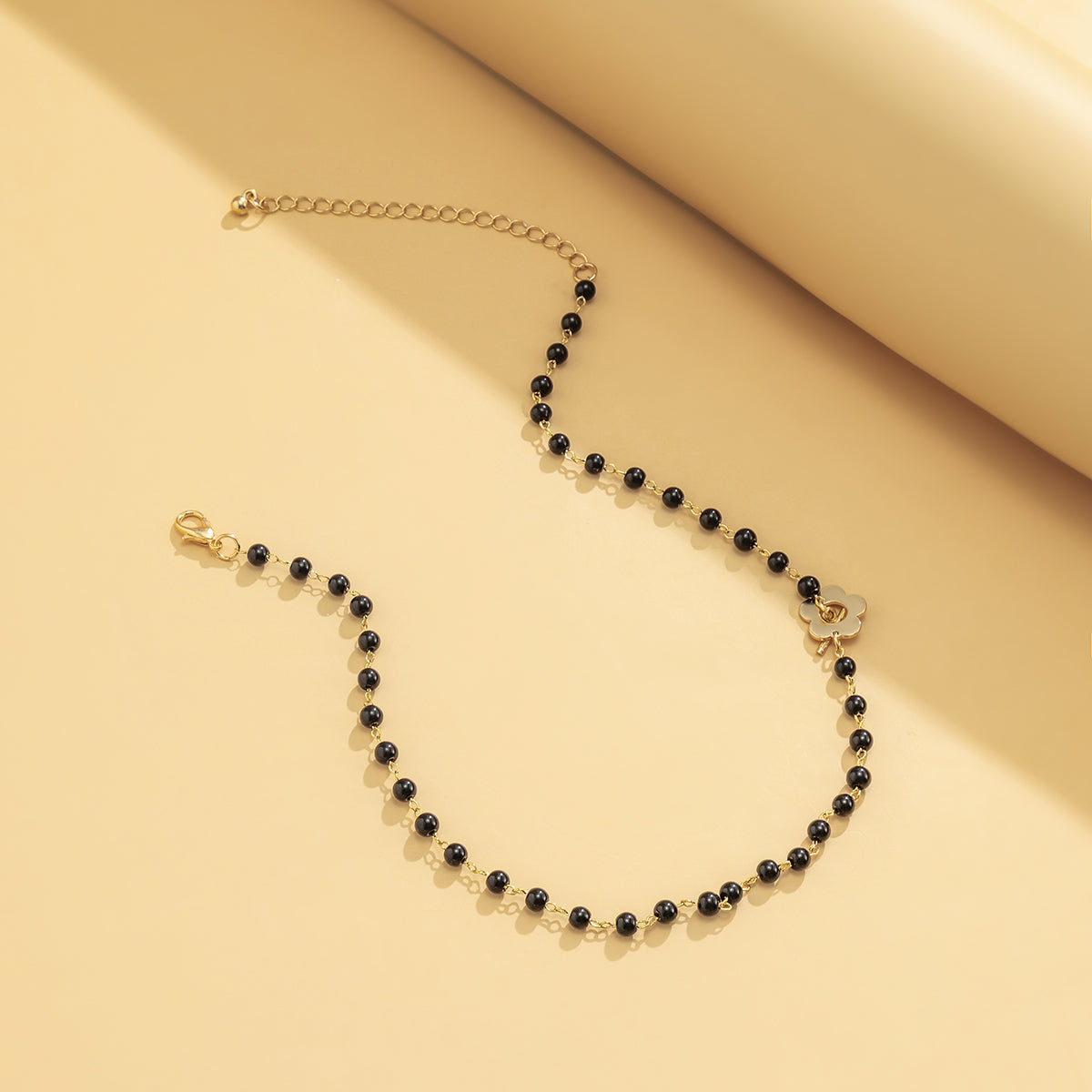 Black and 18K Gold-Plated Flower Choker Necklace, gold pendant necklace for women, botanical inspired, lifestyle look