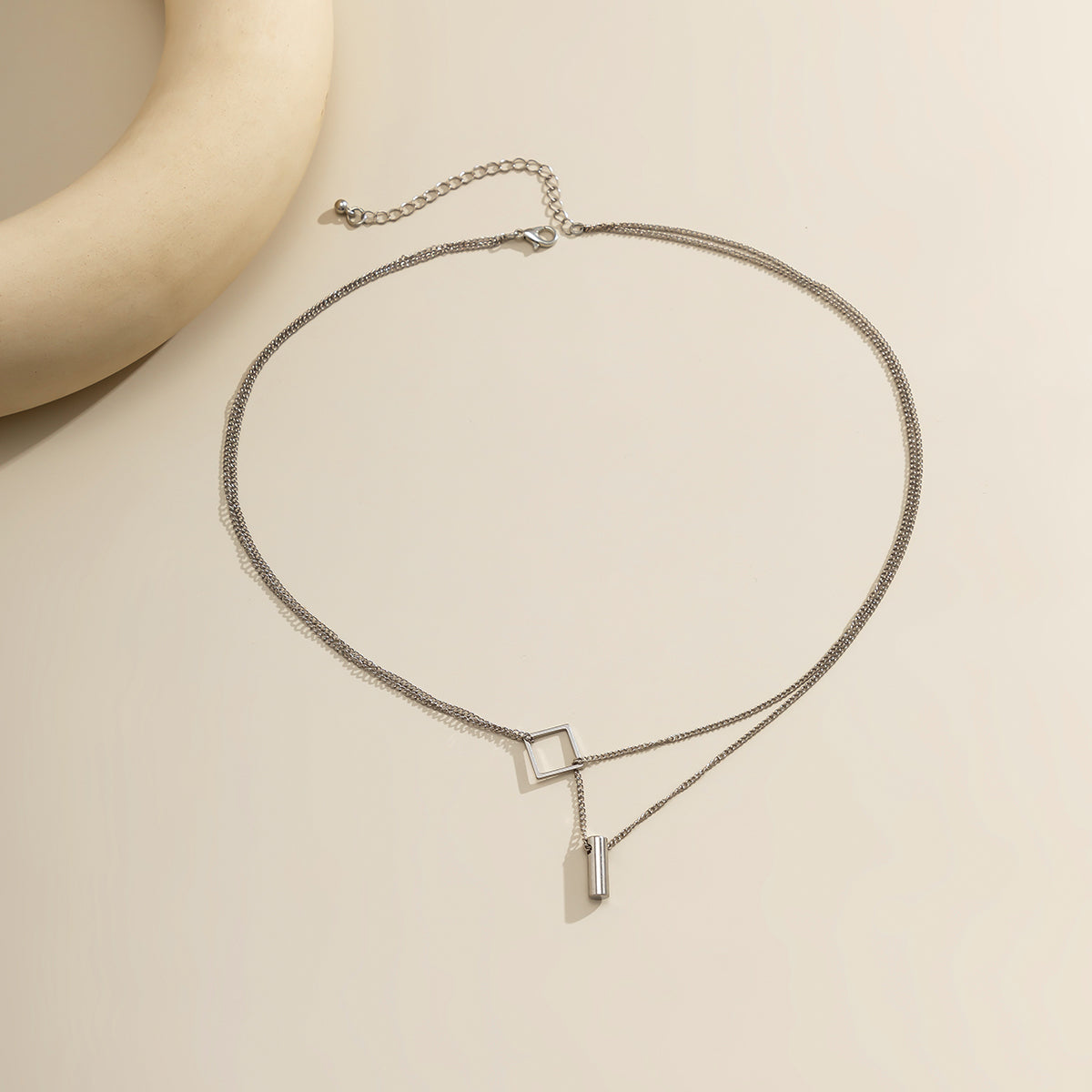 Silver-Plated Rhombus Layered Lariat Necklace, silver pendant necklace for women, vintage-inspired design, lifestyle look