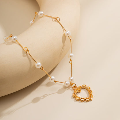 Pearl and 18K Gold-Plated Heart Pendant Necklace, gold pendant necklace for women, botanical inspired, detail close-up