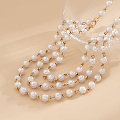 Pearl and 18K Gold-Plated Drop Layered Waist Chain, gold pendant necklace for women, everyday style, lifestyle look