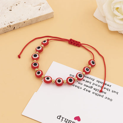 Red Acrylic and Polyster 18K Gold-Plated Eyes Adjustable Bracelet, gold bracelet for women, detail close-up
