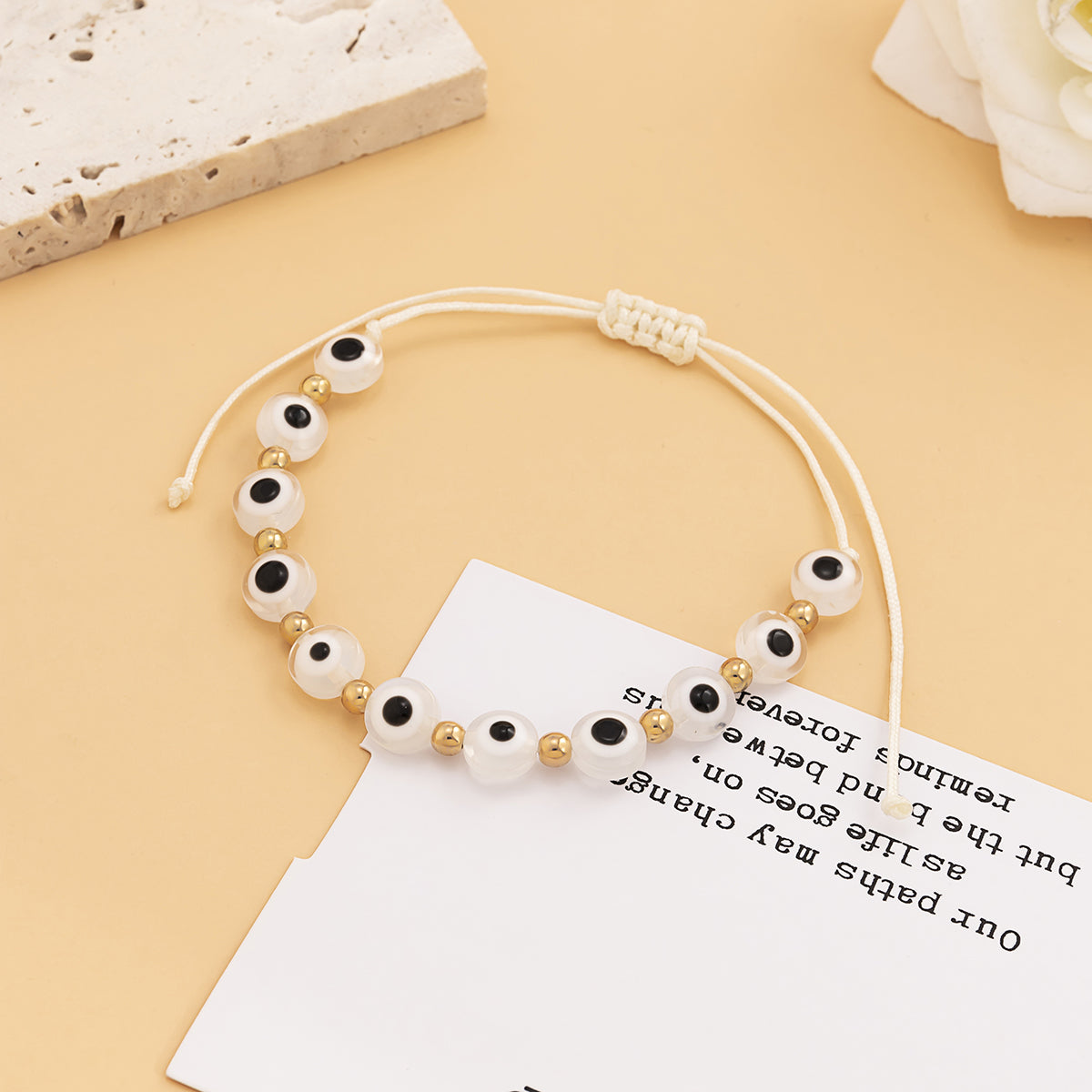White Acrylic and Polyster 18K Gold-Plated Eye Beaded Adjustable Bracelet, gold bracelet for women, detail close-up