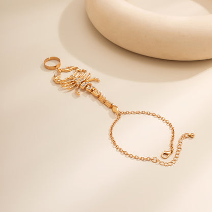 Cubic Zirconia and 18K Gold-Plated Scorpion Wrist-To-Ring Bracelet, gold bracelet for women, detail close-up