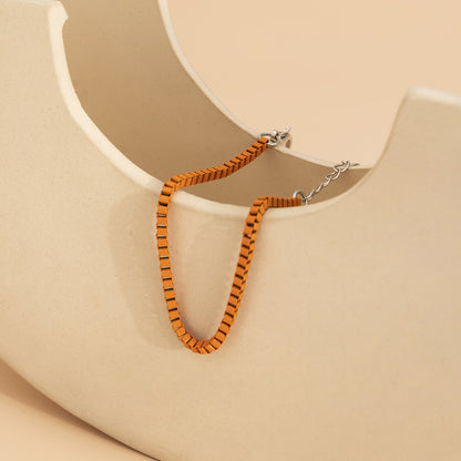 Orange Enamel and Silver-Plated Box Chain Adjustable Bracelet, silver bracelet for women, vintage-inspired design, side view