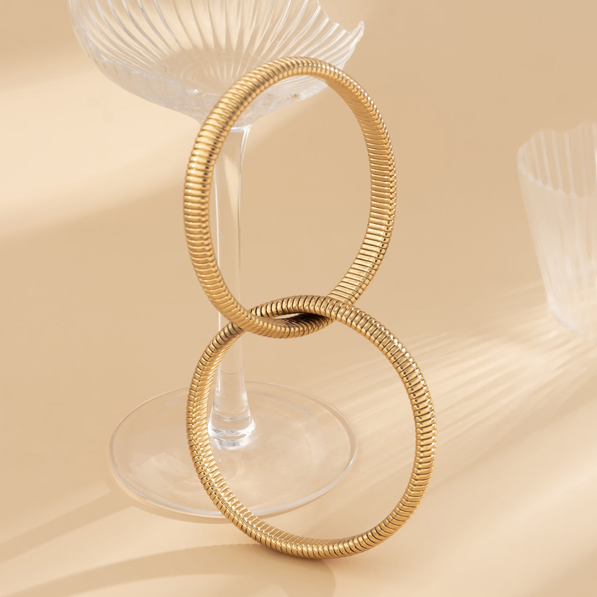 18K Gold-Plated Interlocked Bangle, gold bangle bracelet, vintage-inspired design, styled look