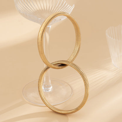 18K Gold-Plated Interlocked Bangle, gold bangle bracelet, vintage-inspired design, styled look