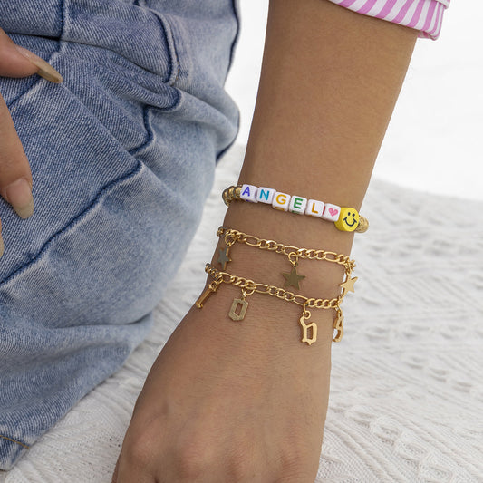 White Acrylic and 18K Gold-Plated 'Love Angel' Beaded Stretch Bracelet Set, jewelry gift sets for women, front view