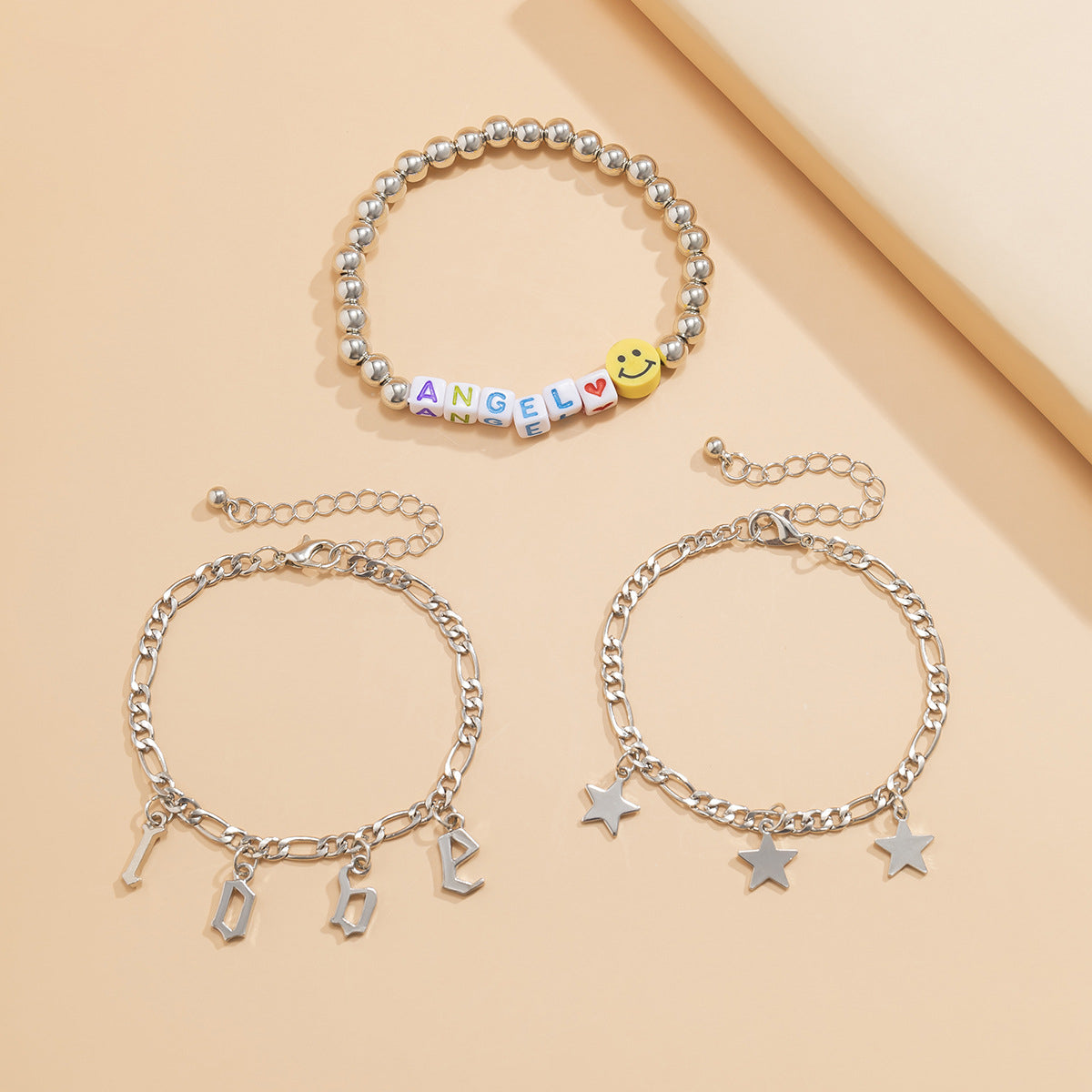 White Acrylic and Silver-Plated 'Love Angel' Beaded Stretch Bracelet Set, jewelry gift sets for women, detail close-up
