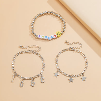 White Acrylic and Silver-Plated 'Love Angel' Beaded Stretch Bracelet Set, jewelry gift sets for women, detail close-up