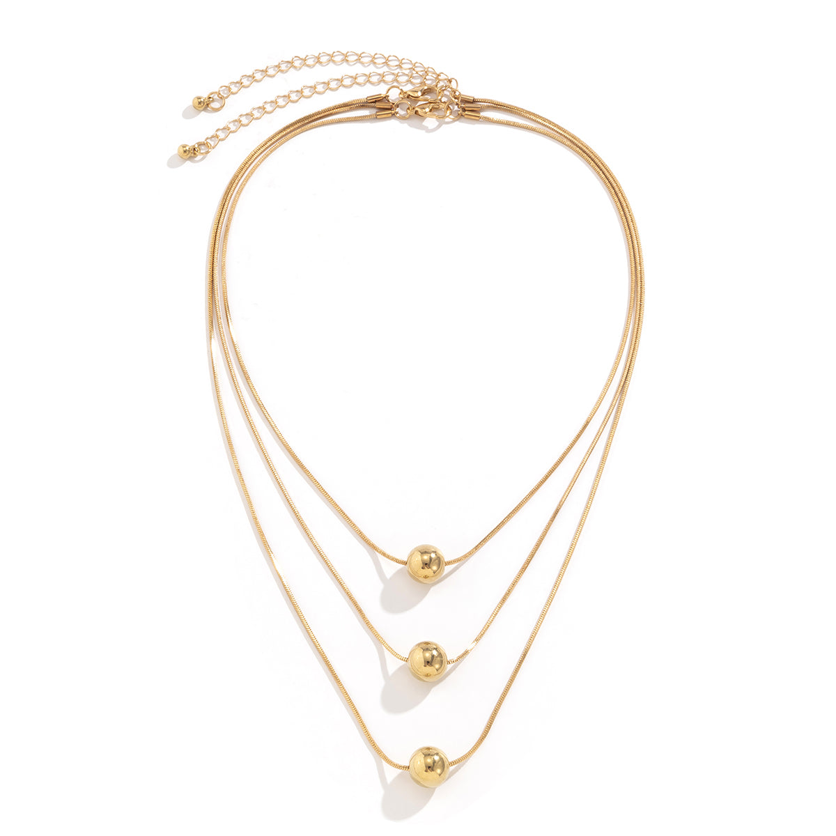 18K gold-plated necklace set showcasing a chic golden ball design with three intertwined strands for a stylish look.