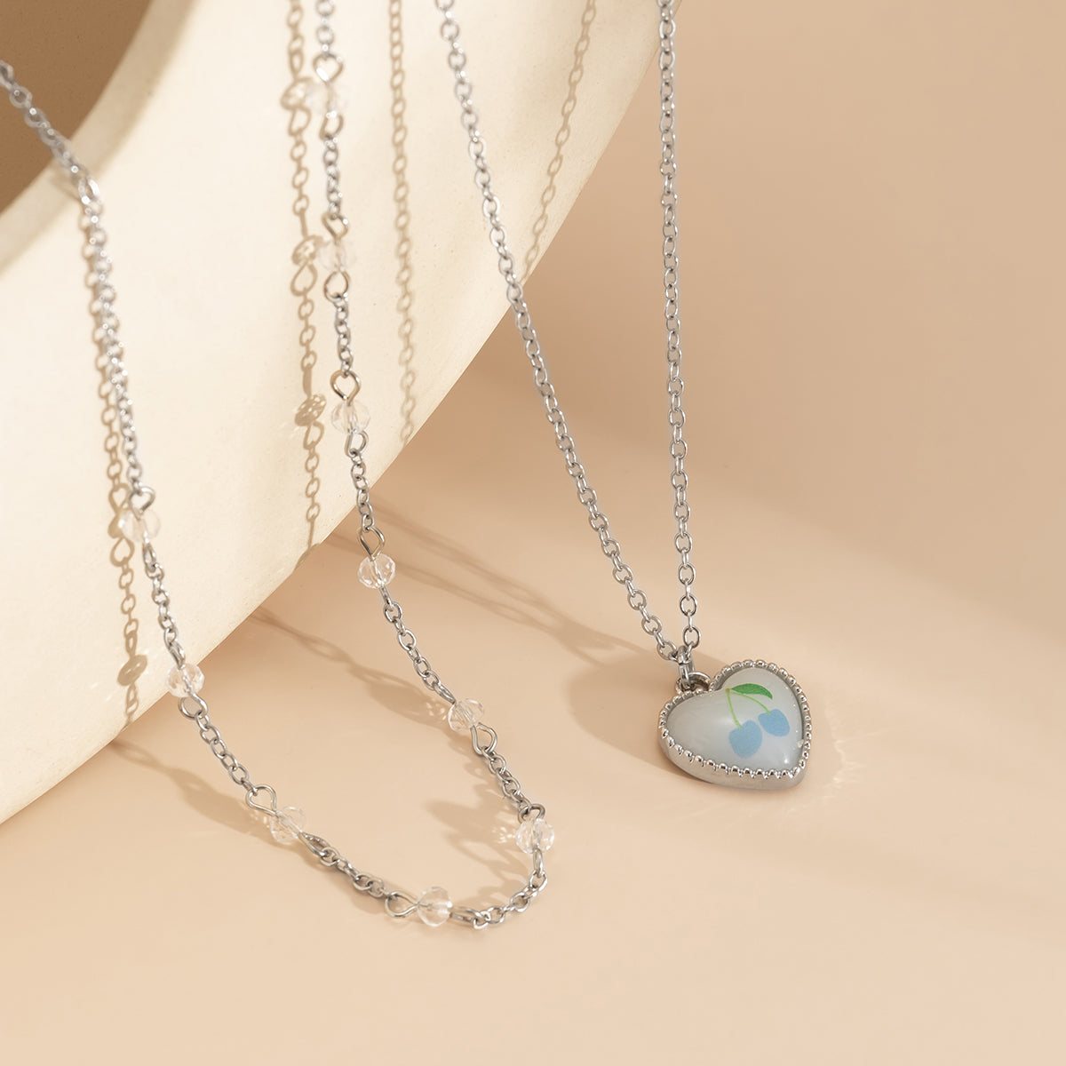 White Resin and Silver-Plated Cherry Heart Pendant Necklace, jewelry gift sets for women, detail close-up