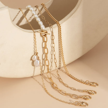 Pearl and 18K Gold-Plated Four-Piece Toggle Anklet Set, jewelry gift sets for women, botanical inspired, lifestyle look