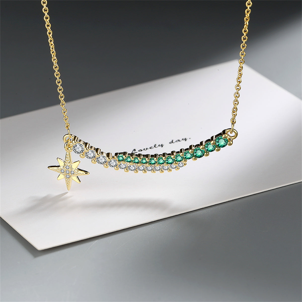 Cubic Zirconia and 18K Gold-Plated Curved Bar Star Pendant Necklace, gold pendant necklace for women, detail close-up