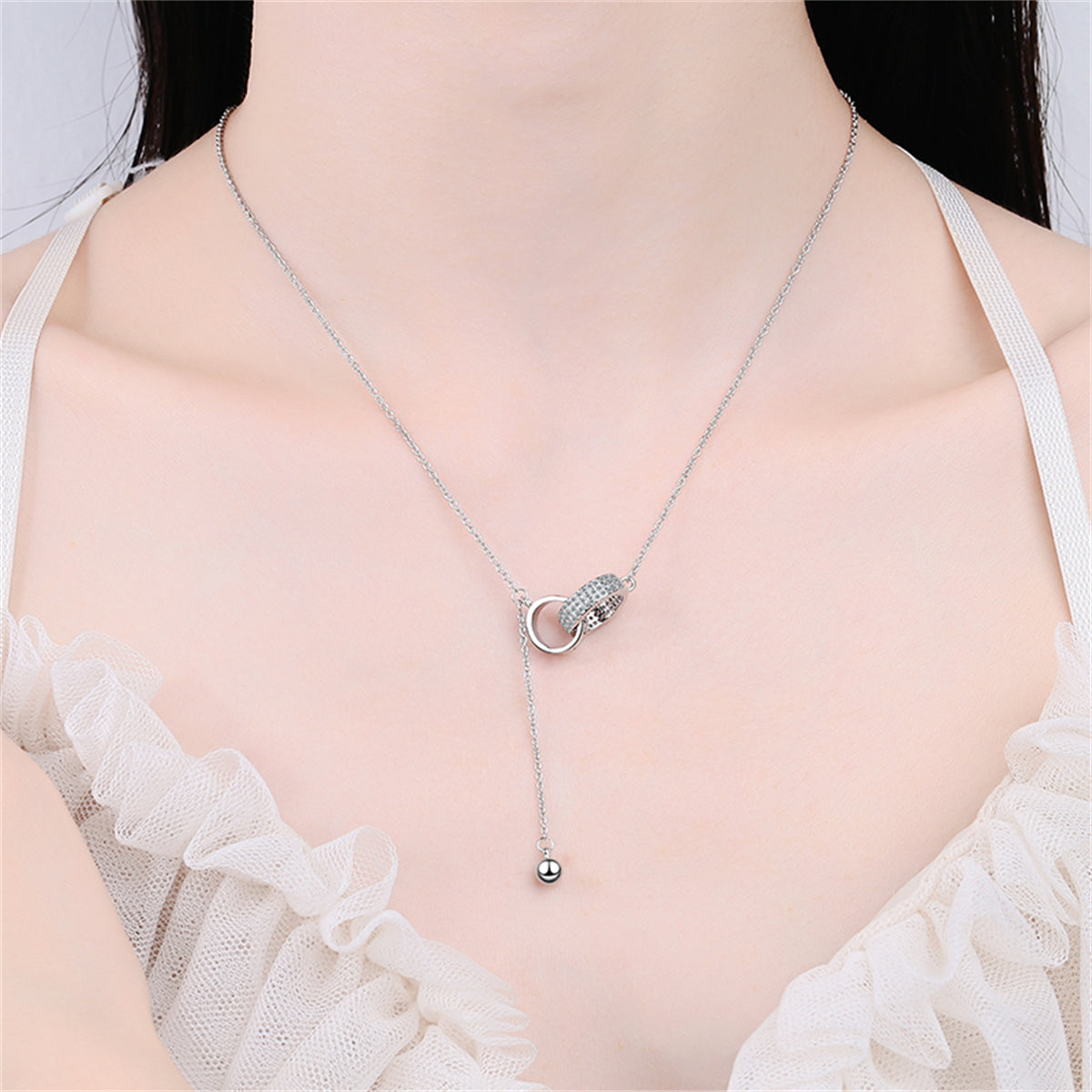 Cubic Zirconia and Silver-Plated Interlocked Rings Lariat Necklace, silver pendant necklace for women, side view