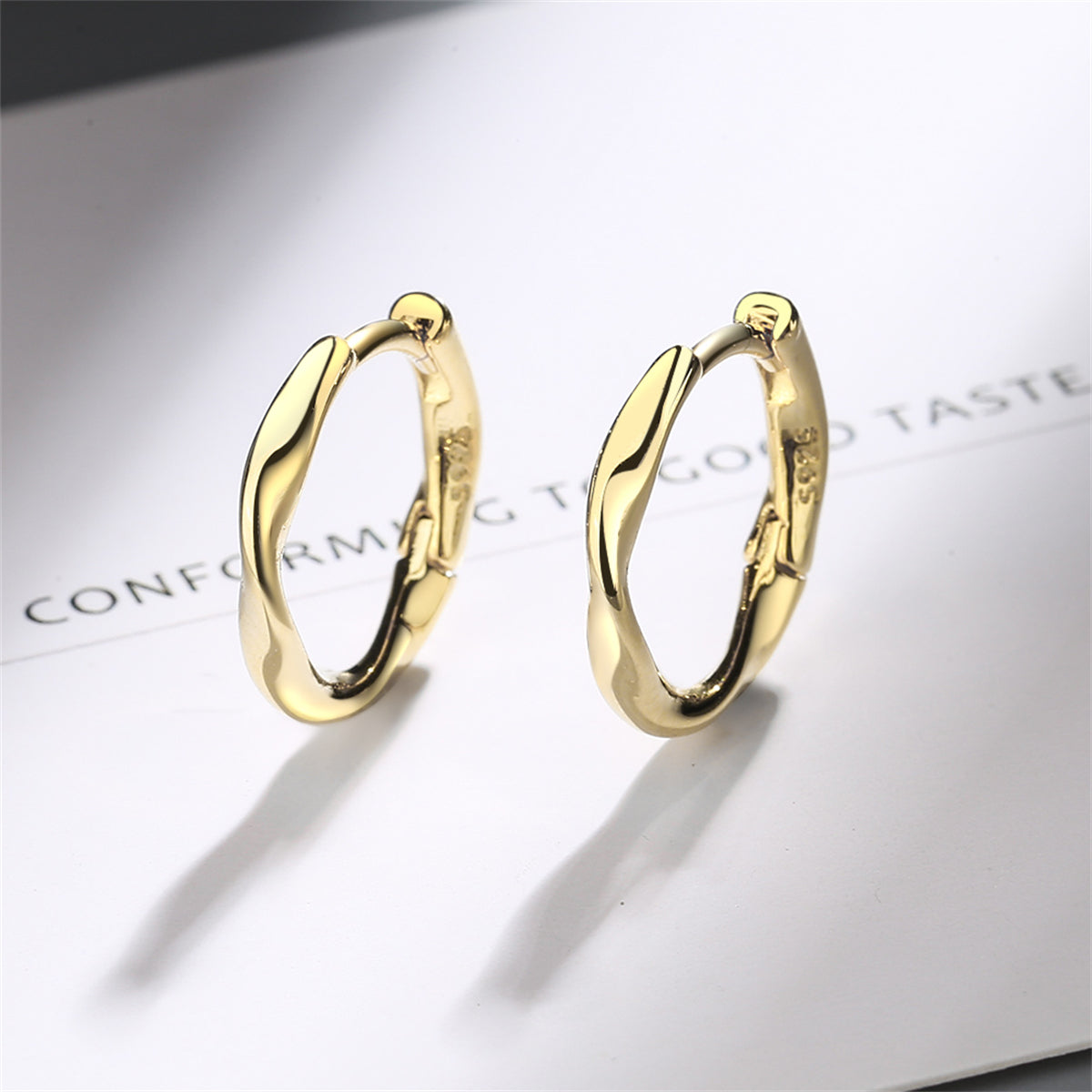 18K Gold-Plated Wave Huggie Earring, gold huggie earrings, botanical inspired, front view