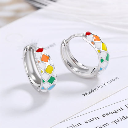 Yellow Enamel and Silver-Plated Geometric Huggie Earrings, silver huggie earrings, dainty minimalist design, detail close-up