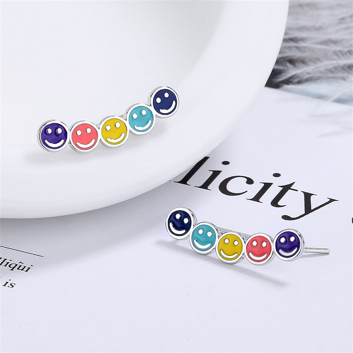Multicolor and Silver-Plated Smiley Ear Climbers, silver stud earrings for women, dainty minimalist design, detail close-up