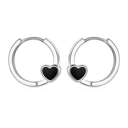 Black Enamel and Silver-Plated Heart Huggie Earrings, silver huggie earrings, botanical inspired, lifestyle look