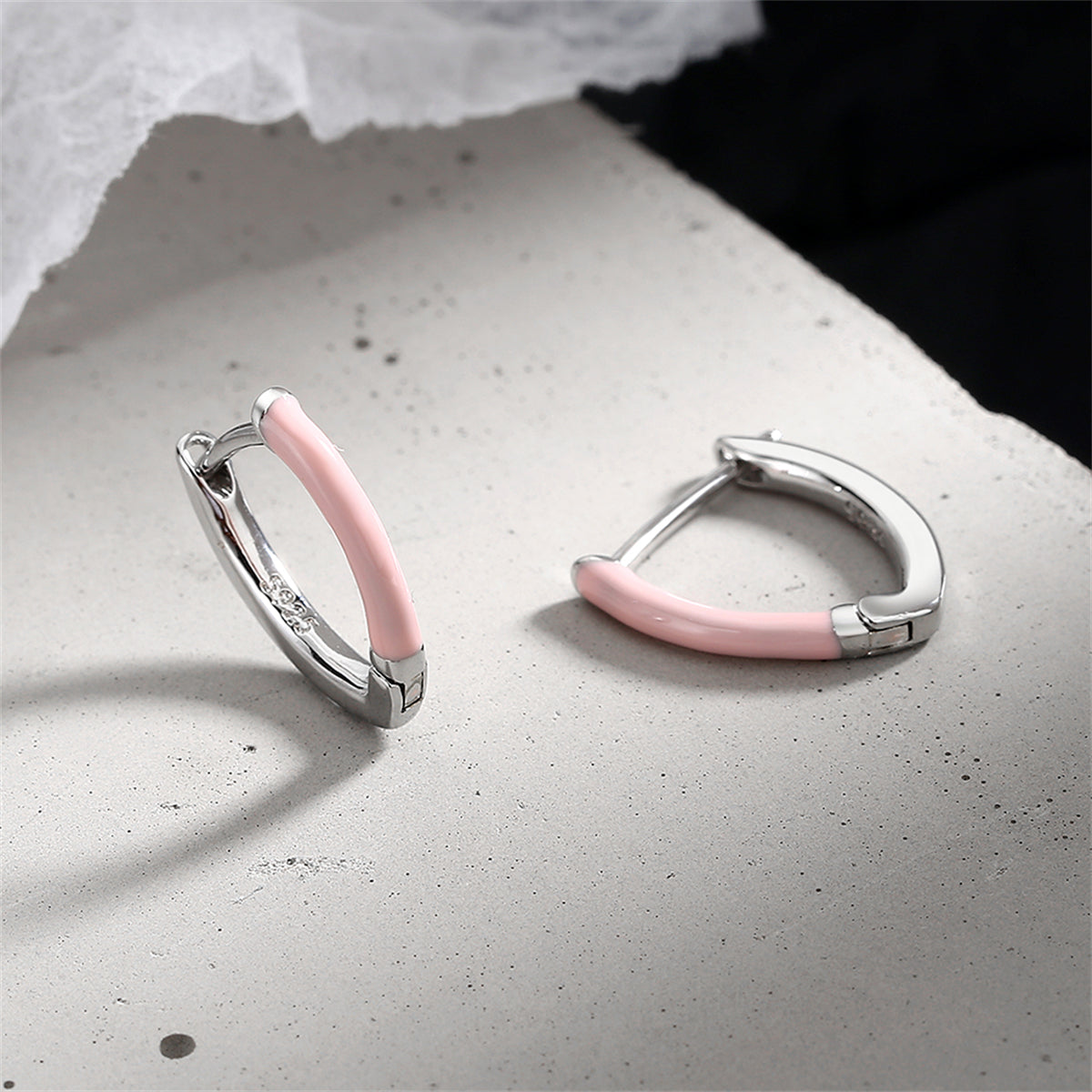 Pink Enamel and Silver-Plated Triangle Huggie Earrings, silver huggie earrings, botanical inspired, front view