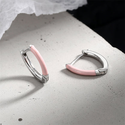 Pink Enamel and Silver-Plated Triangle Huggie Earrings, silver huggie earrings, botanical inspired, front view