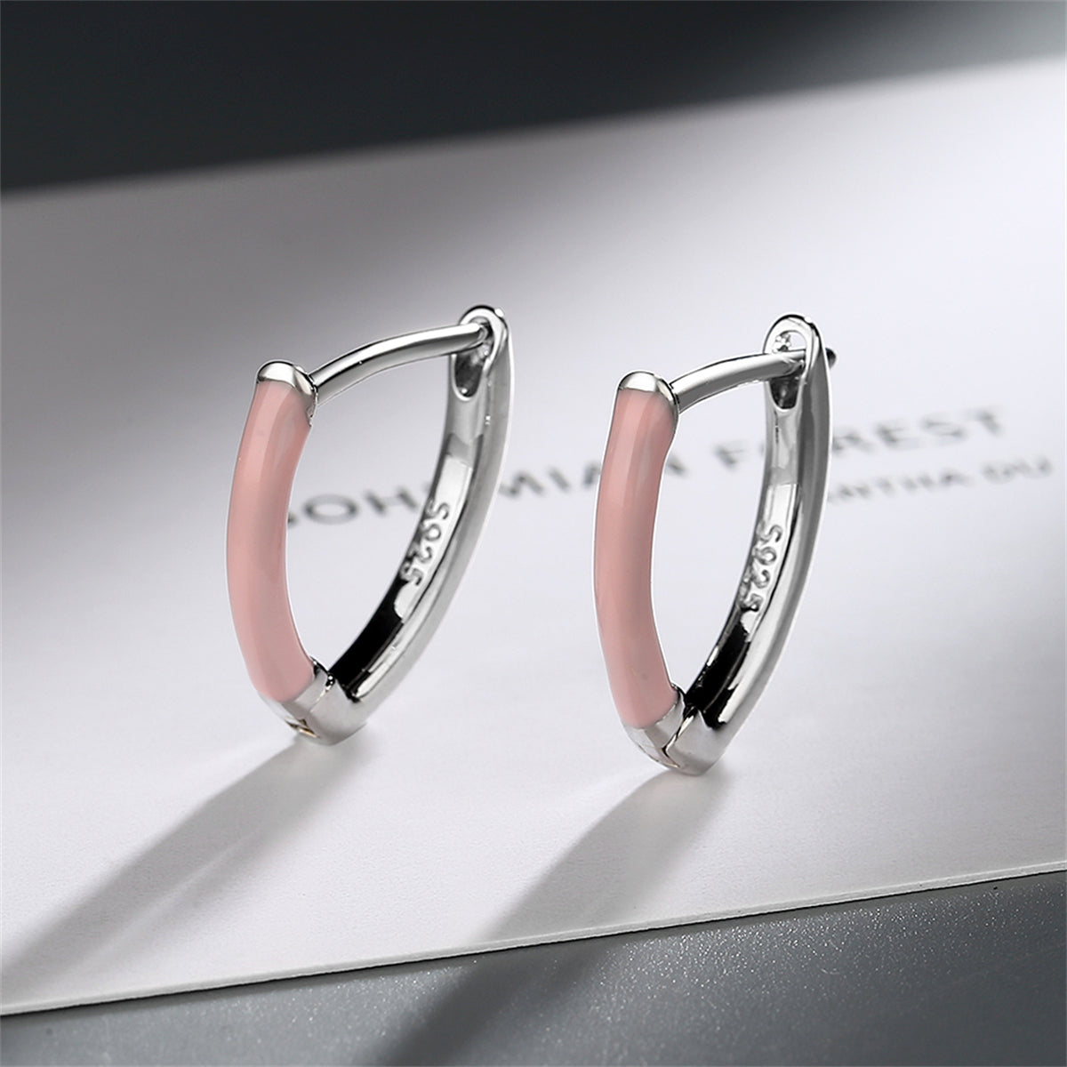 Pink Enamel and Silver-Plated Triangle Huggie Earrings, silver huggie earrings, botanical inspired, side view
