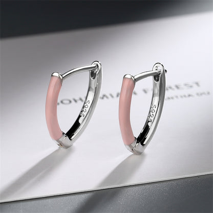 Pink Enamel and Silver-Plated Triangle Huggie Earrings, silver huggie earrings, botanical inspired, side view