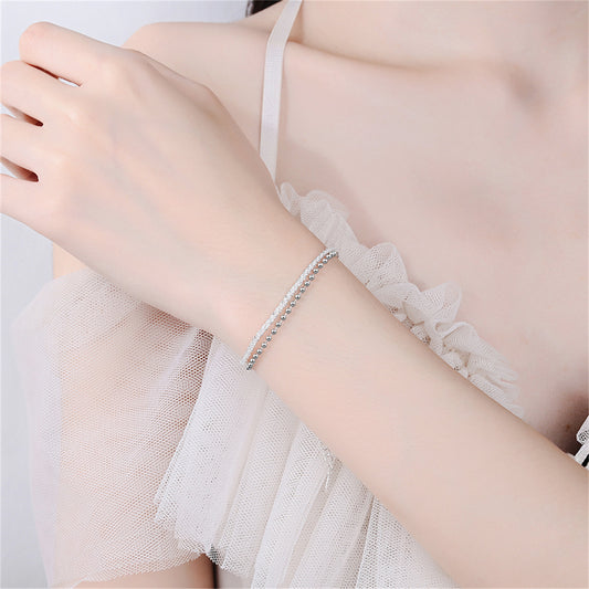 Silver-Plated Twine and Bead Chain Layered Bracelet, silver bracelet for women, dainty minimalist design, front view