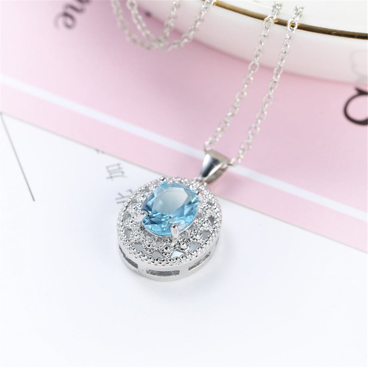 Sea Blue Crystal and Silver-Plated Oval Pendant Necklace, silver pendant necklace for women, everyday style, side view