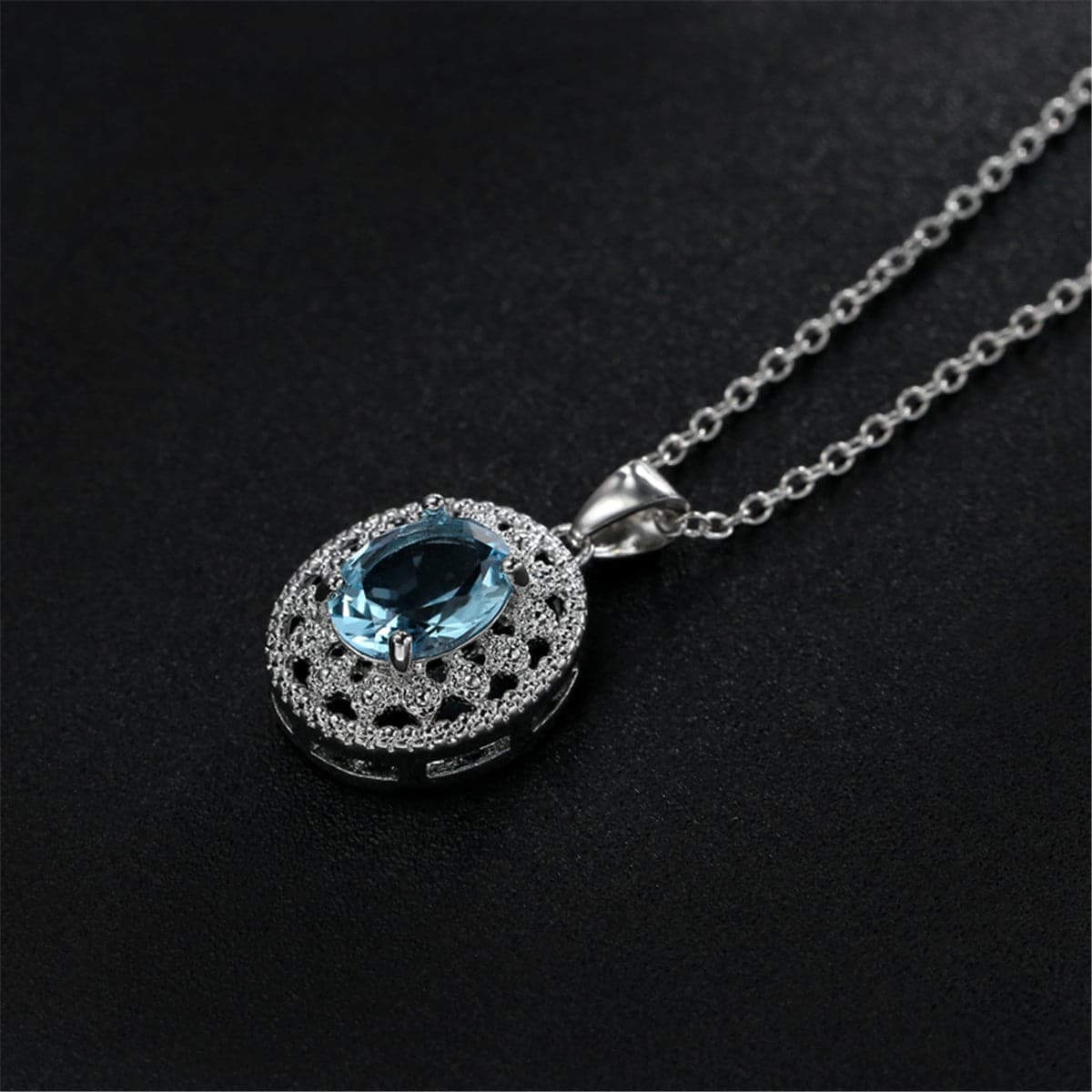 Sea Blue Crystal and Silver-Plated Oval Pendant Necklace, silver pendant necklace for women, everyday style, detail close-up