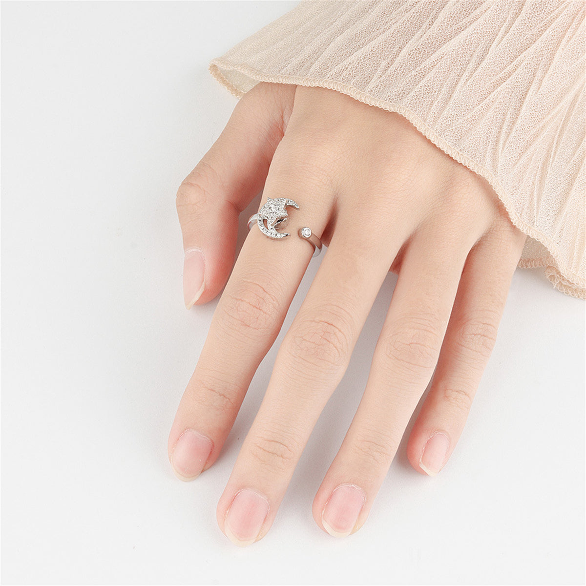 Crystal and Cubic Zirconia Rotating Floral Moon Ring, statement rings for women, vintage-inspired design, detail close-up