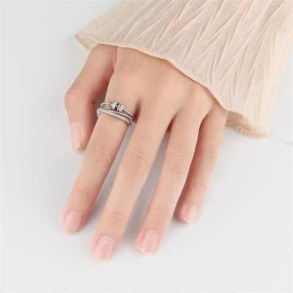 Cubic Zirconia and Silver-Plated Coil Crisscross Open Ring, silver statement rings for women, botanical inspired, side view