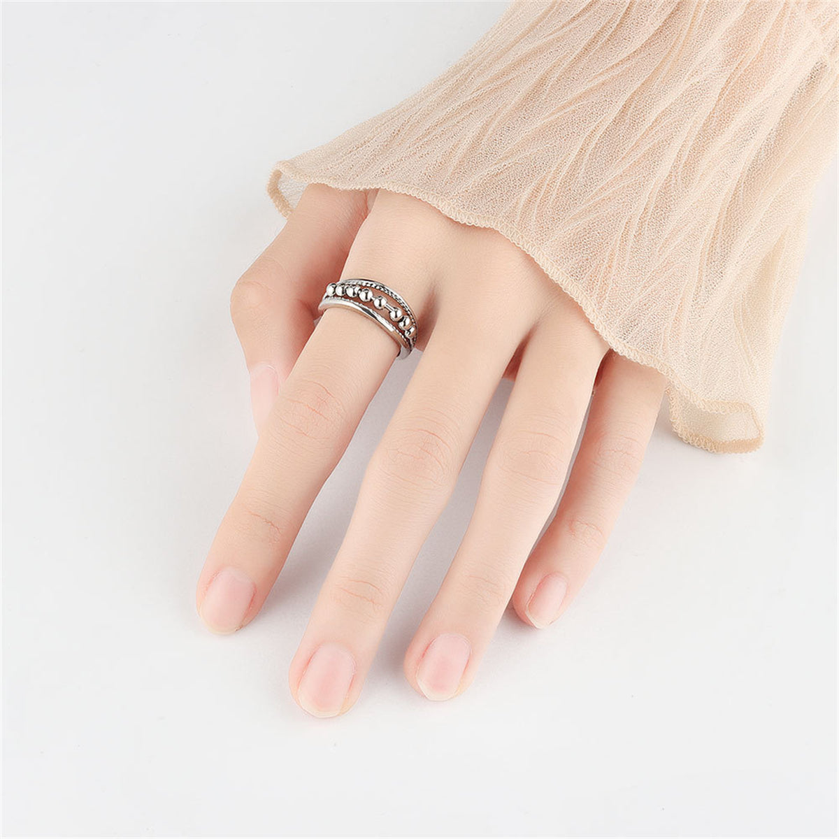 Silver-Plated Beaded Adjustable Ring, silver statement rings for women, vintage-inspired design, lifestyle look