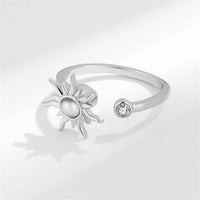 Quartz & Silvertone Rotating Sun Open Ring