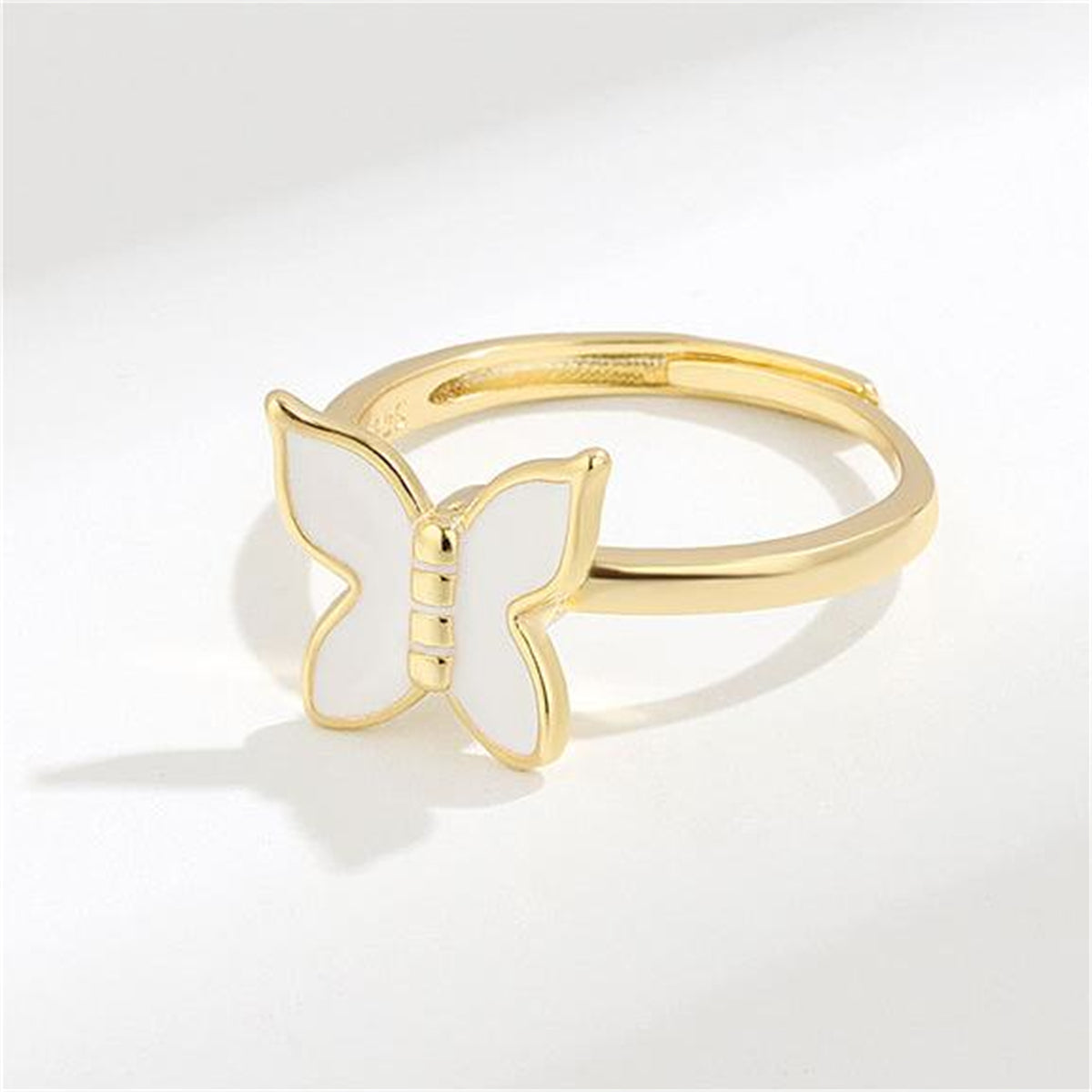 White Enamel and 18K Gold-Plated Rotating Butterfly Ring, gold statement rings for women, detail close-up