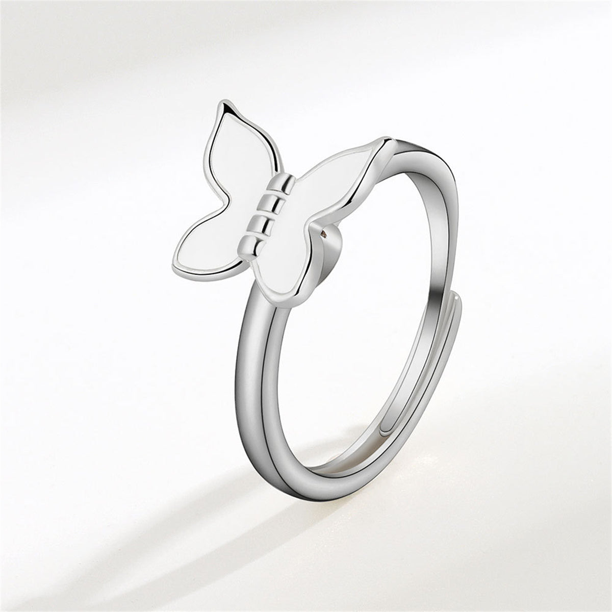 White Enamel and Silver-Plated Rotatable Butterfly Adjustable Ring, silver statement rings for women, front view