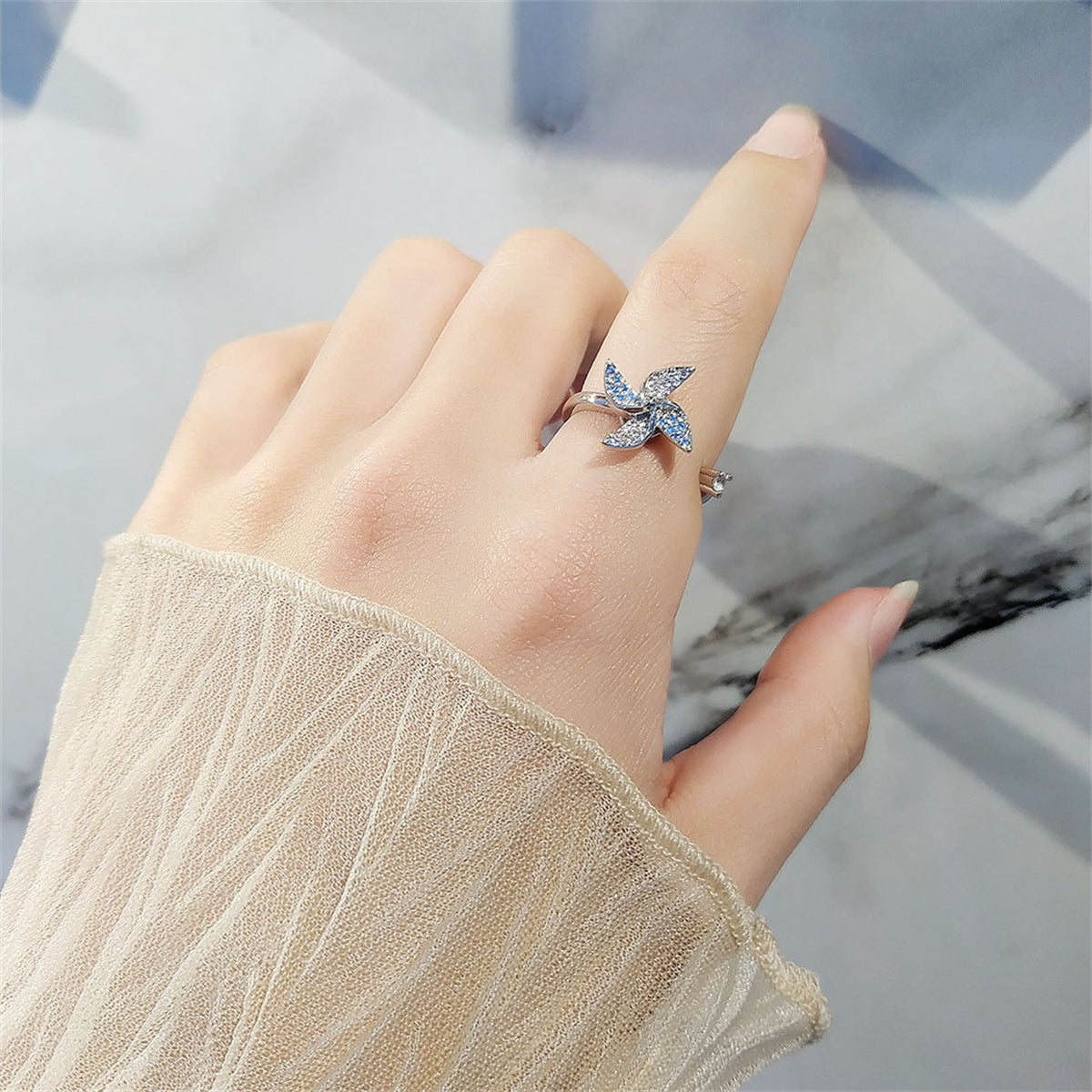 Cubic Zirconia and Silver-Plated Rotating Windmill Open Ring, silver statement rings for women, lifestyle look