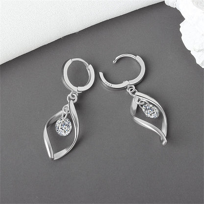 Crystal and Silver-Plated Twisted Drop Huggie Earrings, silver huggie earrings, vintage-inspired design, detail close-up
